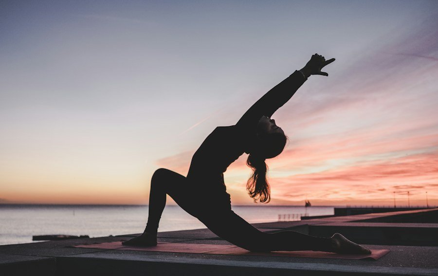 A woman practising yoga in a light-filled studio